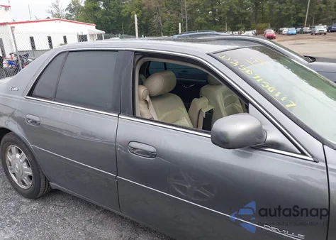 2003 Cadillac Deville Standard z USA, uszkodzony, nr VIN 1G6KD54Y63U242009